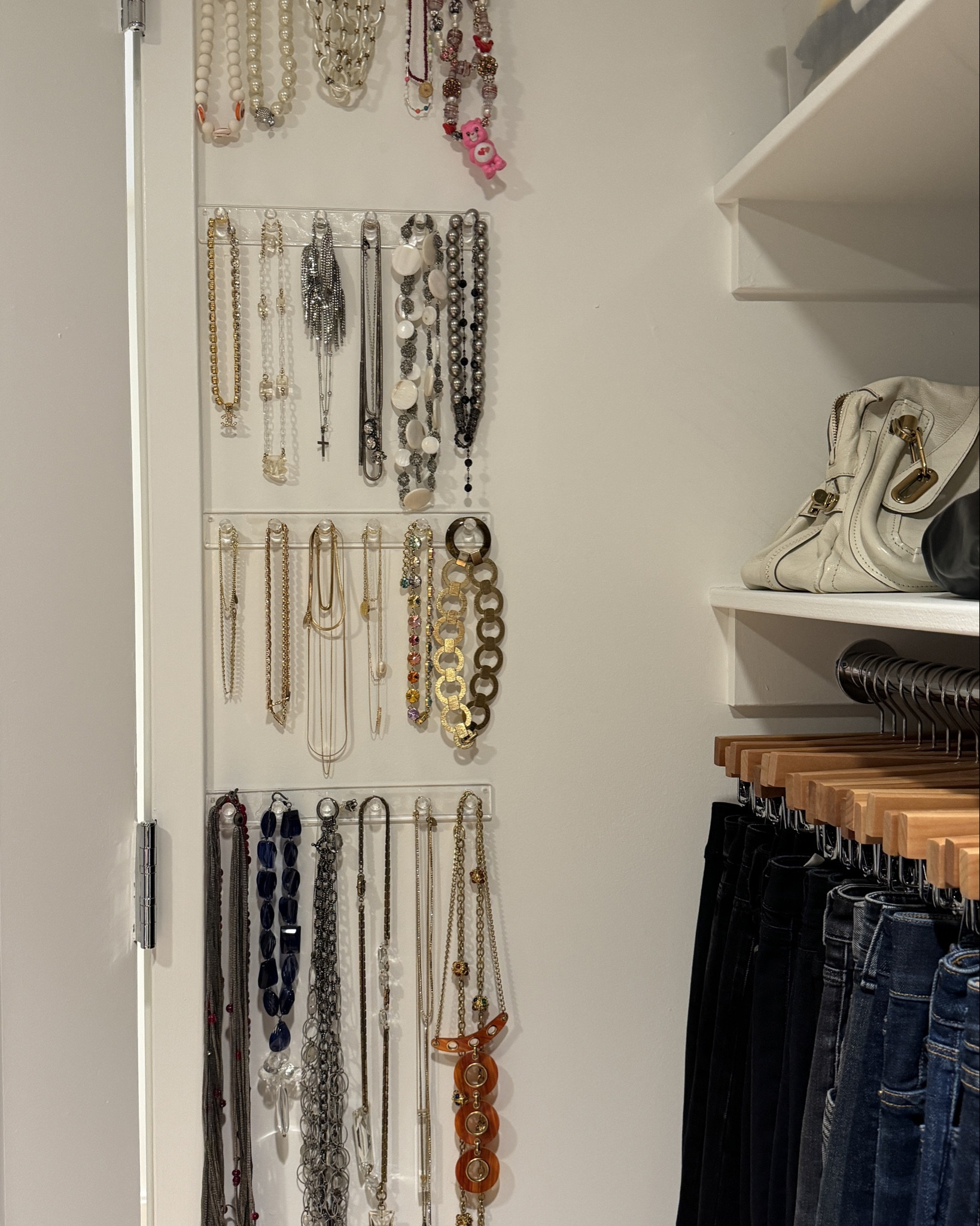 the three things that helped make the most of this small walk in closet. 

first: acrylic hooks hung with nano tape. i love these hooks for necklaces + bracelets. using nano tape makes 'installing' so easy as there's no hardware. i'll warn you the tape that comes with these isn't great, so i include the tape i use. be sure to wipe the walls downs beforehand. measure out where you need them based on what you're hanging and use a level to make it perfect!

second: wood pant hangers. matching hangers keeps everything  at the same level making seeing what you have easier. i organized the pants by type + color. 

third: acrylic sorters for small bags. not can you see what you have, but not having the bags touching eachother protects them.

#LTKHome