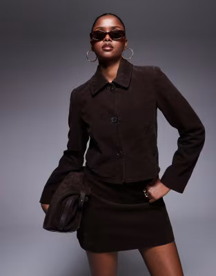 River Island corduroy mini skirt in dark brown | ASOS (Global)