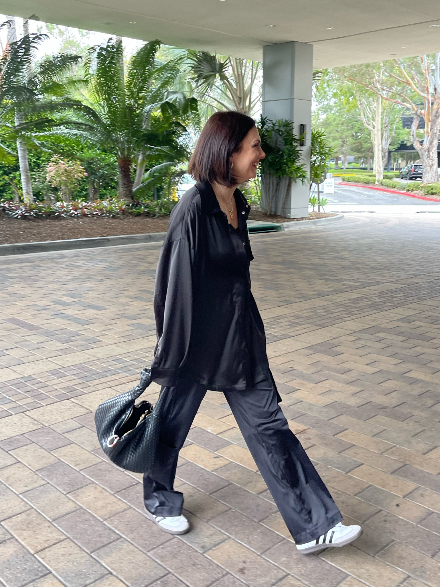 Satin button down and satin cargo pants with adidas samba sneakers and anthropologie woven knot bag 

#LTKSeasonal #LTKitbag #LTKshoecrush