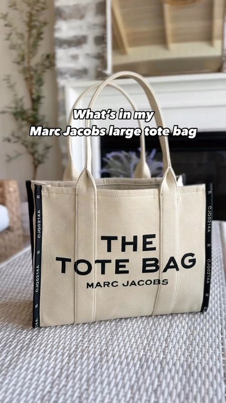 #ad Comment MUST HAVE below, and I’ll message you the link to shop! Can you believe this Marc Jacobs bag is from Walmart ?! I’ve been eyeing the Marc Jacobs tote bags for a while now and decided to get the jacquard large tote bag in the warm sand color as my a work/travel bag.  This comes in so many colors and sizes, and I almost got the blue one. 😍  #walmartpartner @walmartfashion #walmartfashion

#LTKGiftGuide #LTKItBag #LTKStyleTip