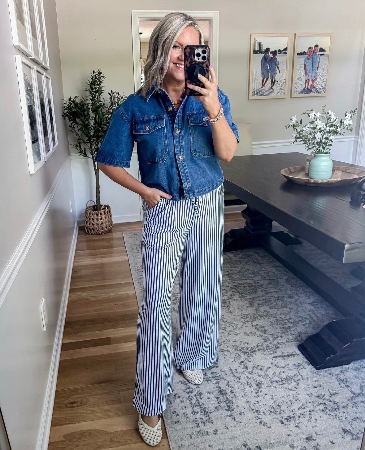 Trending! This denim button up paired with striped wide leg pants is such a fun mix of classic and playful. I love how the structured top balances the relaxed fit pants for an effortless outfit that works for everyday style, travel days, or casual plans.

denim button up, striped wide leg pants, casual chic outfit, everyday style, elevated basics, summer outfit idea, travel outfit, relaxed fashion, denim outfit inspiration, lovelylifestyling

#LTKootd #LTKSeasonal #LTKOver40
