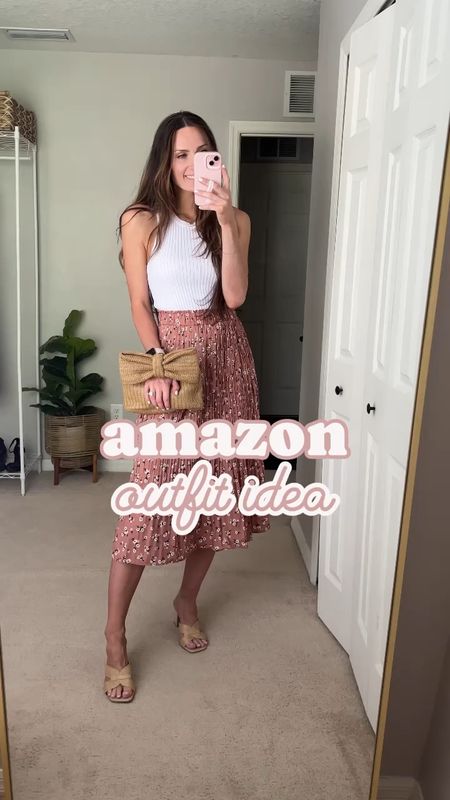 Amazon spring/summer outfit idea!
Amazon flowy skirt, Amazon bow clutch straw bag.

**sizing:
Skirt: small- fits tts I’m wearing color “white flowers pink print” not sure why it’s called that! It’s definitely more brown!
Tank: m, fits tts
heels: 8.5, fit tts 

#LTKitbag #LTKVideo #LTKSeasonal