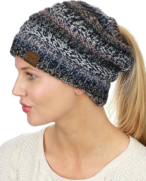 C.C BeanieTail Soft Stretch Cable Knit Messy High Bun Ponytail Beanie Hat | Amazon (US)