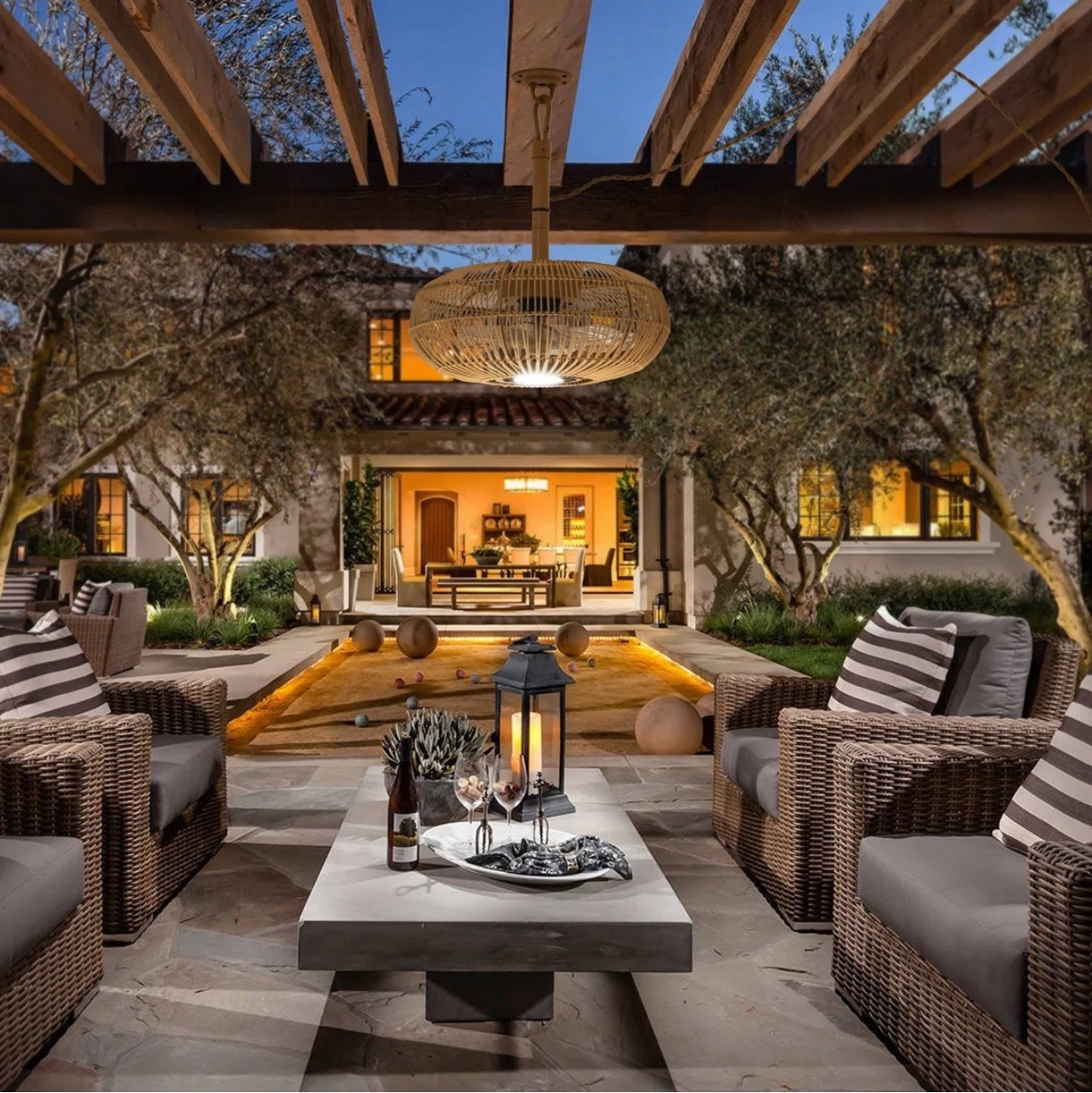 Imagine ending your day here—soft lighting, warm flames, and elevated outdoor seating designed for effortless entertaining. This modern outdoor living room blends luxury patio furniture, a sleek built-in fireplace, and layered textures to create a resort-style backyard retreat. Perfect for homeowners seeking high-end outdoor design inspiration, cozy fire pit seating, and sophisticated exterior living ideas.


#LTKHoliday 

#LTKHome #LTKSeasonal