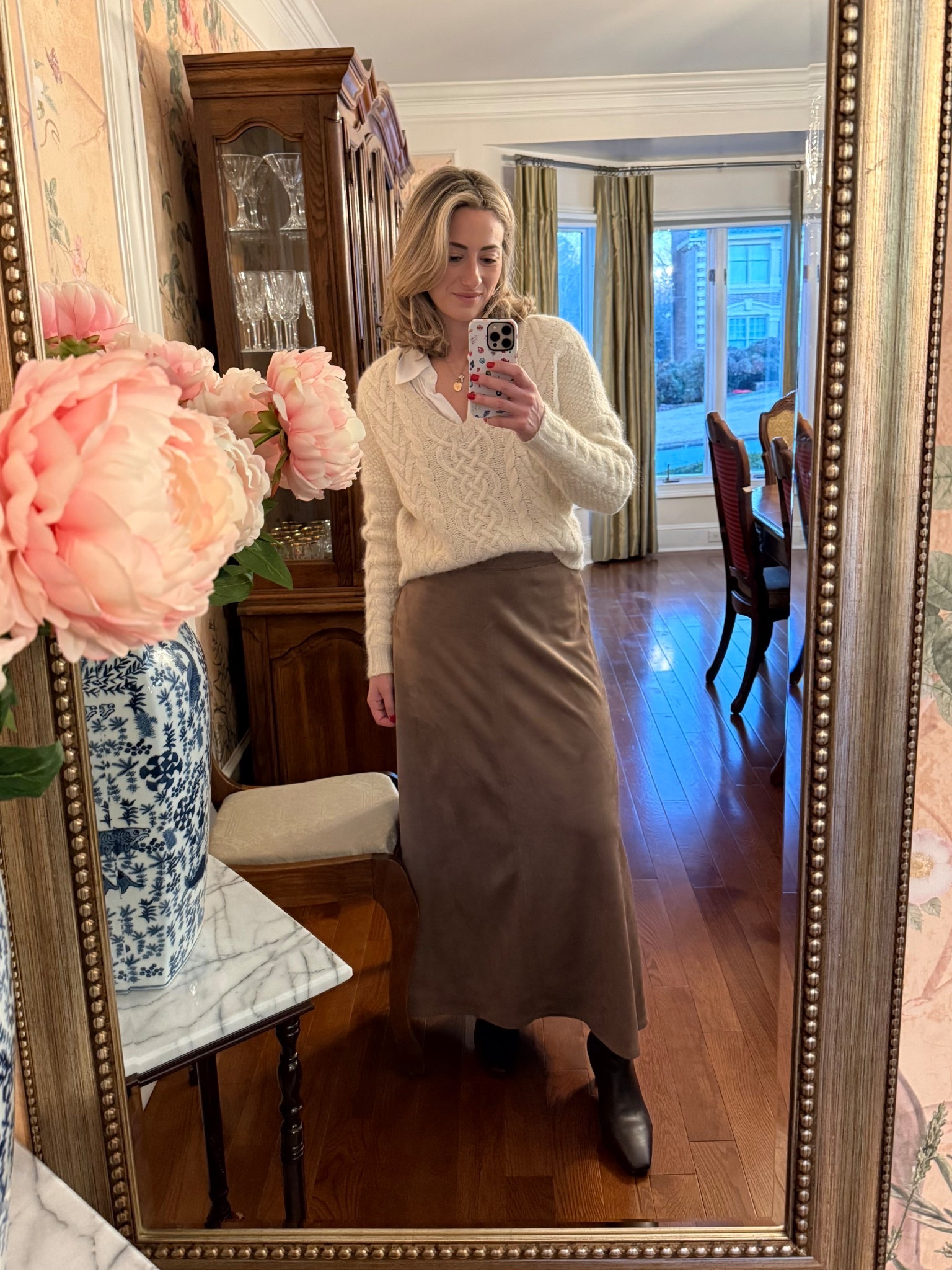 Timeless neutrals with an effortless feel 🤍
Today’s outfit is built around cozy, classic staples. A cable-knit sweater layered over a white button-down, paired with a flowing suede midi skirt and simple boots. Soft textures, neutral tones, and easy layering make this the kind of outfit that feels polished but comfortable, perfect for everyday wear.

✨ Everything is linked here timeless pieces you’ll reach for season after season.


#LTKootd #LTKWorkwear #LTKgrwm