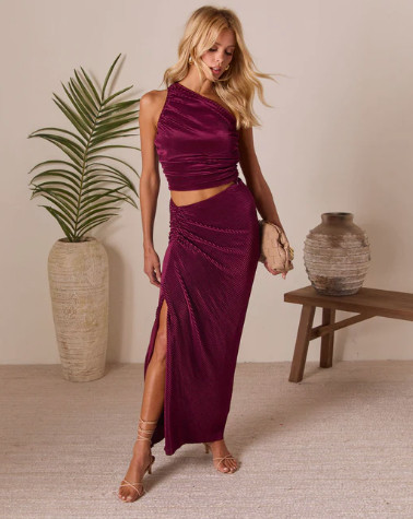 Two-piece dreams come true: the Palmaria Pleated Halter Top + matching Palmaria Pleated Gathered-Front Maxi Skirt set in rich maroon is giving luxe resort, golden hour, vine-covered terrace, all of it 🔥 Whether you're heading to brunch, beachside dinner or a destination wedding, this duo brings statement elegance and major flow.

🔸 Details you’ll love:
• Pleated satin fabric with luxe sheen + lined for coverage. 
• Rigid non-stretch material + gathered ruched front detail + hidden side zipper on skirt. 
• Halter top silhouette that shows off shoulders; maxi skirt length gives dramatic movement.

🔸 Fit & care:
• True to size; XS-XL in both pieces. 

• Fabric: 95% Polyester, 5% Spandex for top’s self; skirt also lined 100% Polyester. 

#matchingSet #co-ordLook #setstyle #pleated #maxiskirt #haltertop #maroonset #resortwear #vacationstyle #eveningoutfit #sunsetvibes #fashionista #OOTD

Tap to shop the full set—this Palmaria duo is turning heads & booking slots in my wardrobe!  

 #LTKSeasonal #LTKFindsUnder100 #LTKWedding
