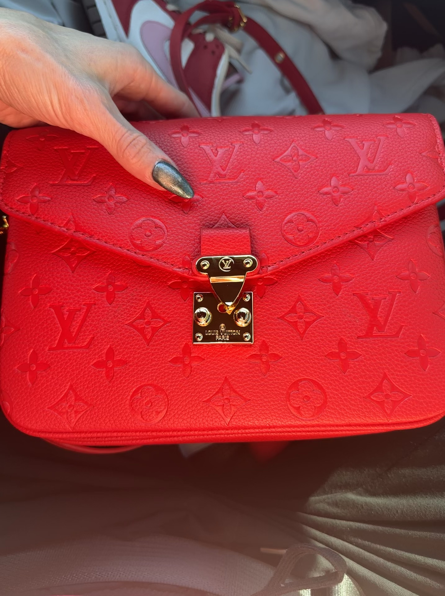 This dupe is sooo good 🤤

I LOVE this bright cherry color 🤌🏻 and it is such great quality! 
This Louis Vuitton red coussin is genuine leather and so soft. (There are 2 red ones on this listing, and this is the bright one). 
3 sections on the inside (no zipper) and one flat zipper pocket on the back. Top handle and long cross body strap with gold closure detail. 
I love this bag! 

#LTKfindsunder50 #LTKitbag #LTKstyletip