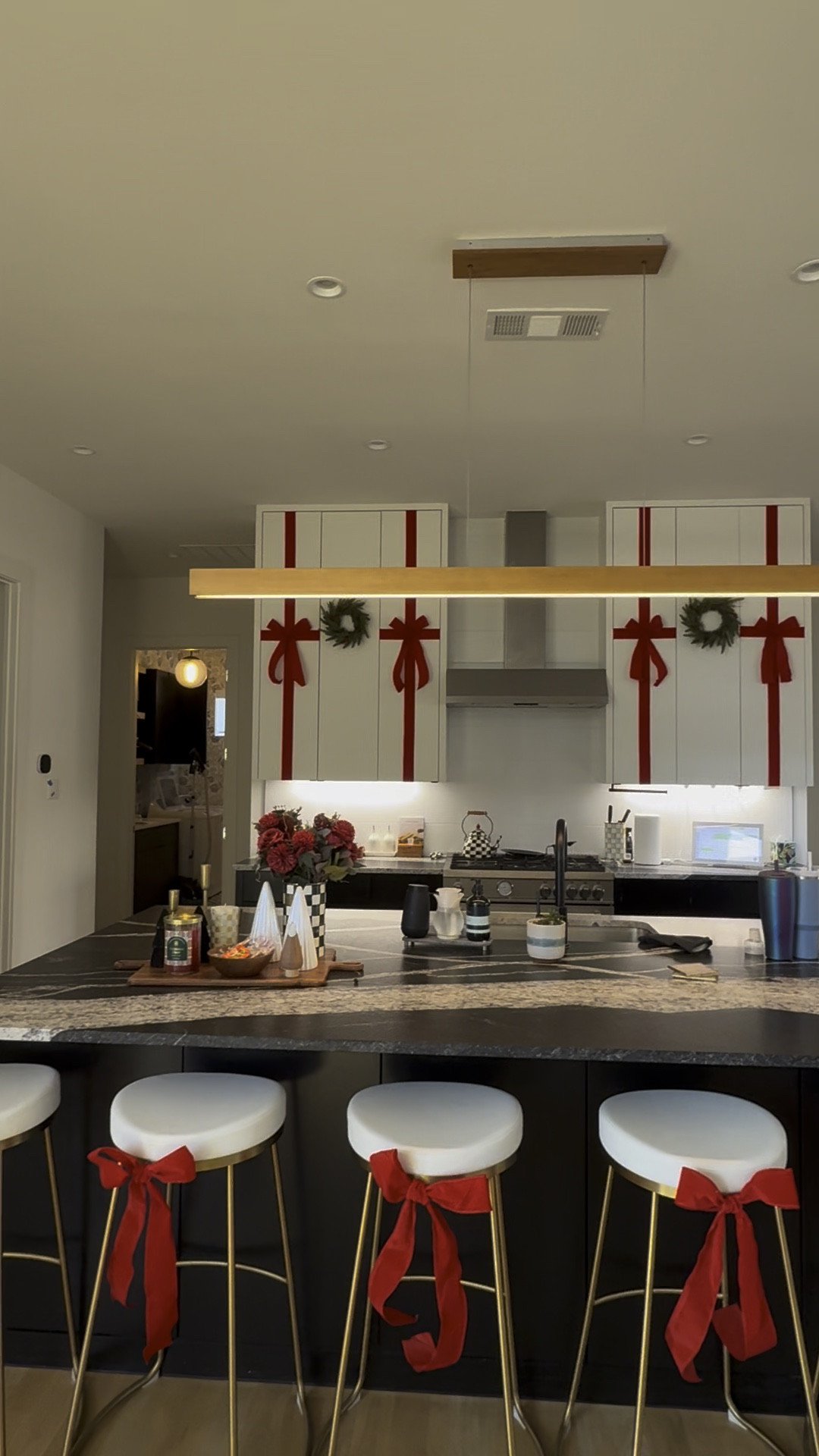 Found this bow idea on tik tok and absolutely love how it turned out 😍

#LTKHoliday #LTKHome #LTKSeasonal