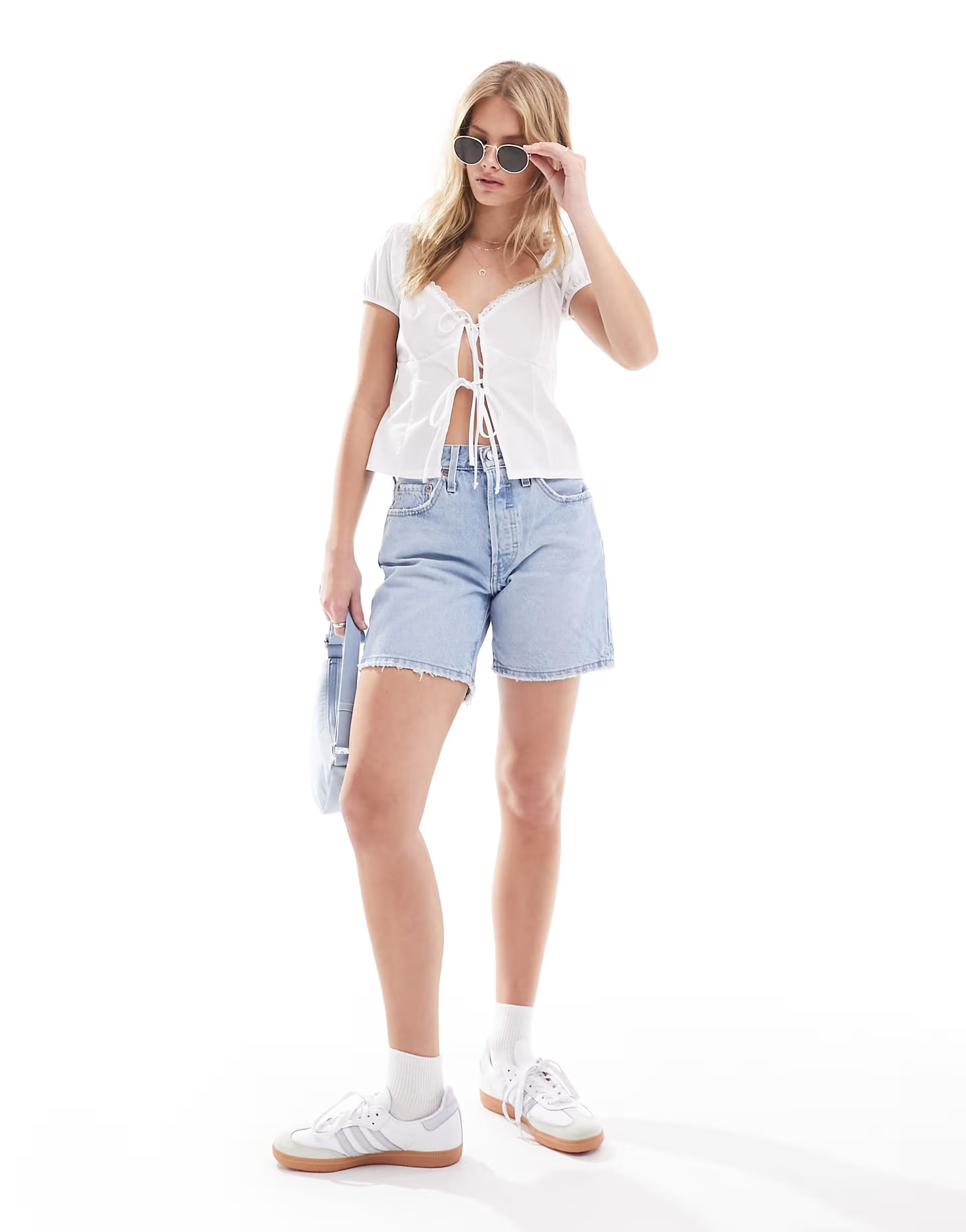 Levi's 501 mid thigh denim short in light blue wash | ASOS (Global)