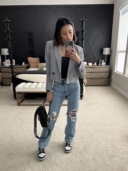 I have 2 pairs of these jeans…one in size 26 for the baggy fit and these are 24. They’re worth every penny. I’ve had my first pair for 4 years! Dress it up with heels or casual with sneakers.