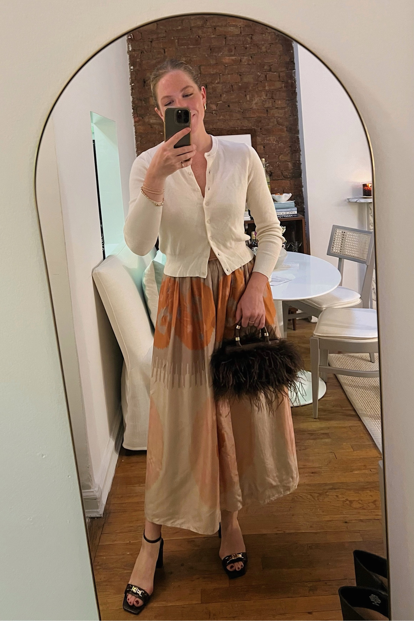 Perfect fall OOTN for tonight’s event! 

Been waiting all year to wear my chocolate brown feather bag! 

My heels are currently 50% off

Skirt is last year from Sezane

#LTKStyleTip #LTKSeasonal #LTKSaleAlert