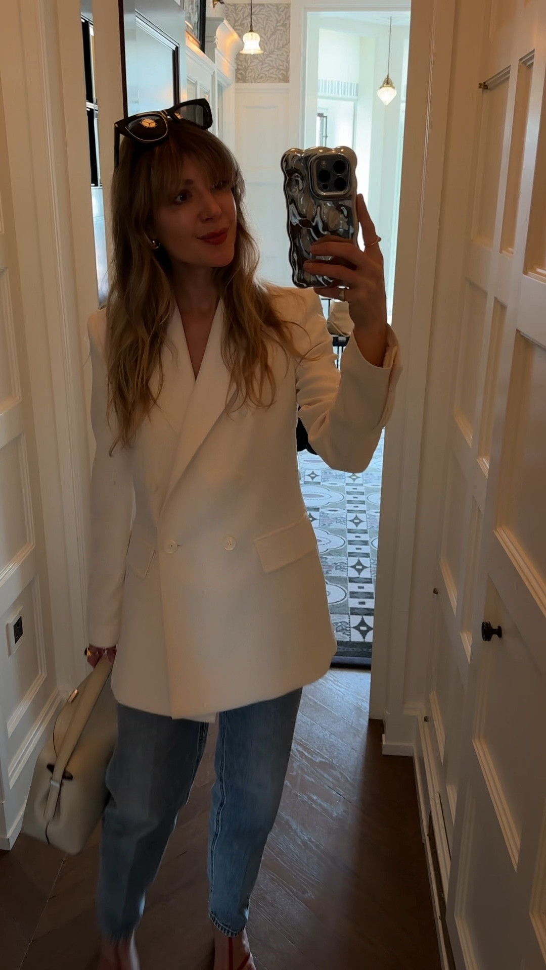 Toteme jeans 
White blazer 
Jil sander red sandals 
Spring outfit 

#LTKworkwear #LTKstyletip #LTKeurope