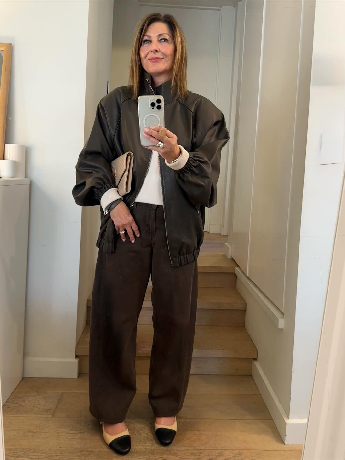 A leather jacket !
It’s got to be big & dramatic. 
Slouchy so it makes a statement. 
Bomber style is good with a Miu Miu/Prada vibe.
Preferably in choc brown.

Do you remember this fabulous jacket @thefrankieshop I nabbed a few months ago from @netaporter ? 

* An exaggerated, oversized cut with big shoulders ( massive!) which means it looks fashiony ( that’s the aim right?) ✔️
* A zip front gives it a sporty relaxed vibe ✔️
* A funnel neck, very on trend (which is my favorite as I’m not a fan of fussy collars )
* An elastic waist (or drop waist really!) So versatile it gives you the option to wear it different ways. Zip it up to sit on your waist or let it hang loose & undone over your bottom✔️
* It’s a rich khaki brown : it works back with blacks & browns but also with cream & khaki ✔️


#LTKaustralia #LTKover50style #LTKwinter