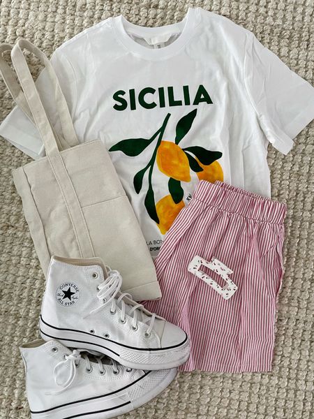 spring fashion. trendy look. casual style. boxer shorts. graphic t shirt. converse. Y2K fashion.

#LTKstyletip #LTKfindsunder100
