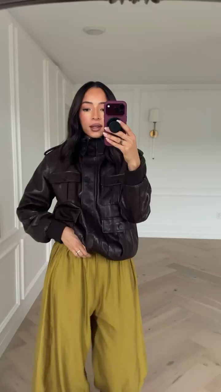 Fall outfit! I got these pants in brown in the spring and knew I needed this green pair for fall! The shape of these pants will make even a basic tee look elevated. This jacket is really soft and looks luxe 😍 Wearing size S white tank, size S faux leather utility jacket, and size S tall lace trim tapered pants

fall fashion, casual outfit, date night outfits, fall fashion hauls, fall jacket, dinner outfit

#LTKSeasonal #LTKootd