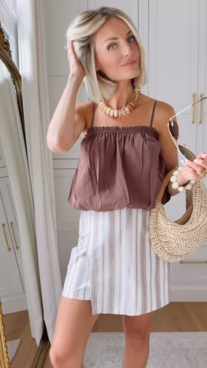 This brown bubble hem top goes with so many things in my closet! This skirt is also super versatile and is currently only $15! 👏🏻 wearing XS in both 

Loverly grey, brown bubble hem top, striped linen skirt, how to style brown tank, raffia bag, vacation fashion finds, resort wear style, Target fashion finds, Zara

#LTKSaleAlert #LTKSeasonal