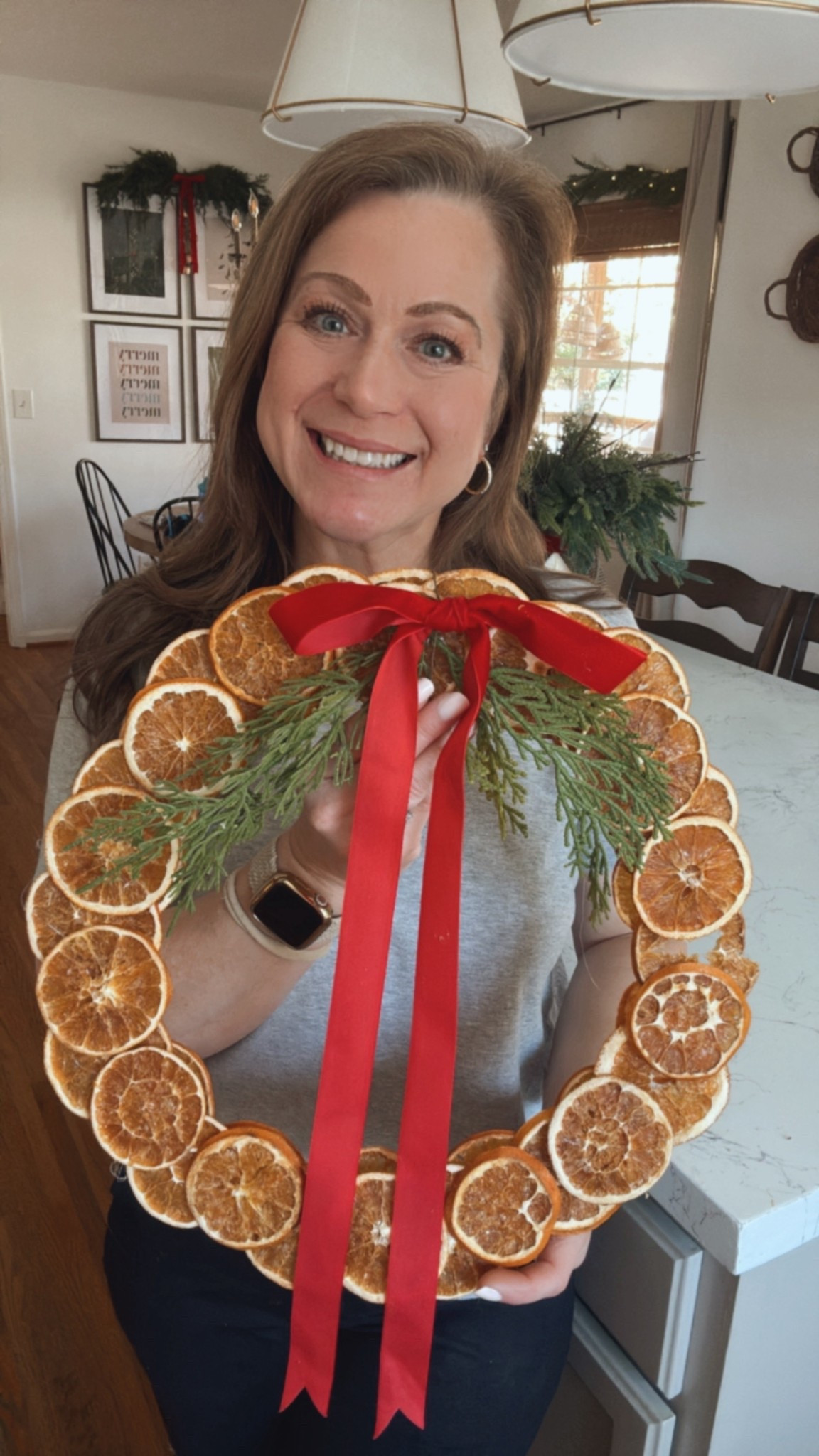 DIY orange slice wreath 
*you can cut and dry your own, but I found some that are already made- saving some
time 😉

I used an old box and cut a ring shape out for the base - mine was about 16” diameter

Layered two layers of orange slices , offsetting the second layer 

Secured with hot glue 

Added some faux cedar pieces leftover from a stem and a velvet bow 

#LTKHoliday #LTKSeasonal #LTKHome