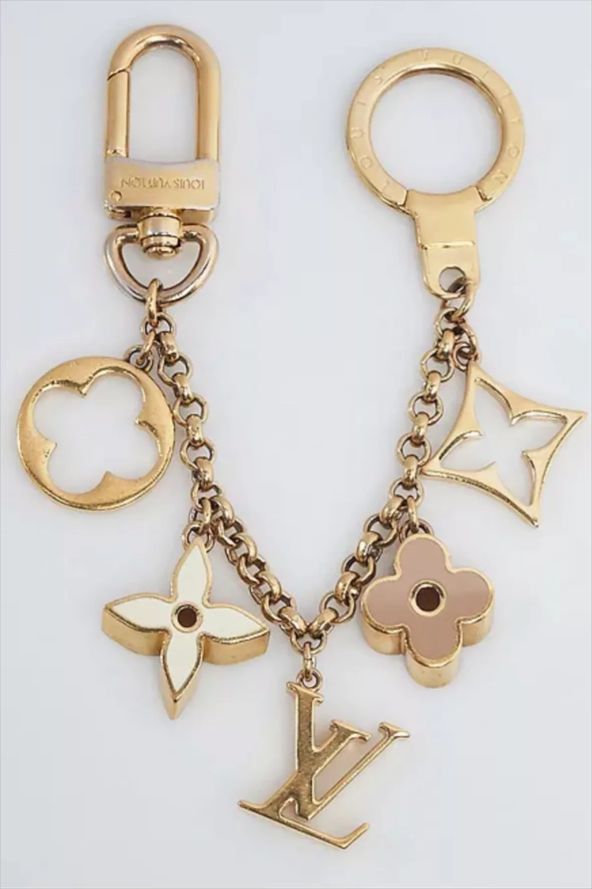 This Dhgate LV keychain is so pretty. $20. Find this and more in