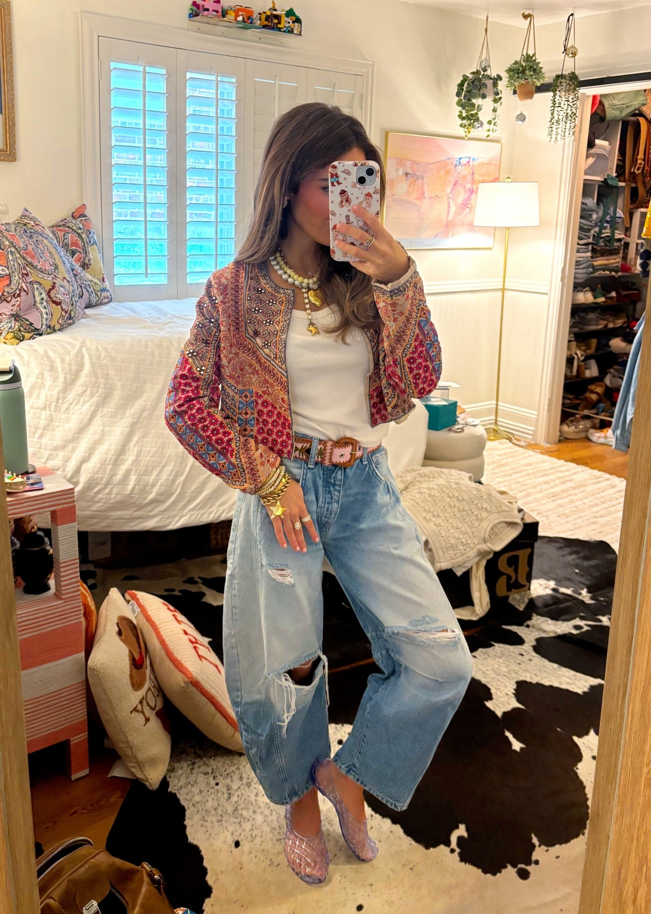 Happy Tuesday! 
Here is today’s ootd breakdown!
I’m 5’2 wearing an XS top, small jacket, 24 jeans, and kids youth 3 shoe (I’m a women’s 6) 

The top is an old target find from last year, if the link is still available I’ll add it, if not I’ll add one of my favs to replace it! 

The jacket is a thrifted soft surroundings piece!

The jeans are FP distressed barrel jeans! My favorite jeans ever! The distressed ones do run smaller than the og’s in my opinion so keep that in mind when shopping! 

My belt is Arloom

Shoes are old navy kids! I’m so happy that jellies are back!

My jewelry is from Jup Jewels, shopfaceeast.square.site, and Melinda Maria

#LTKootd #LTKPetite #LTKgrwm