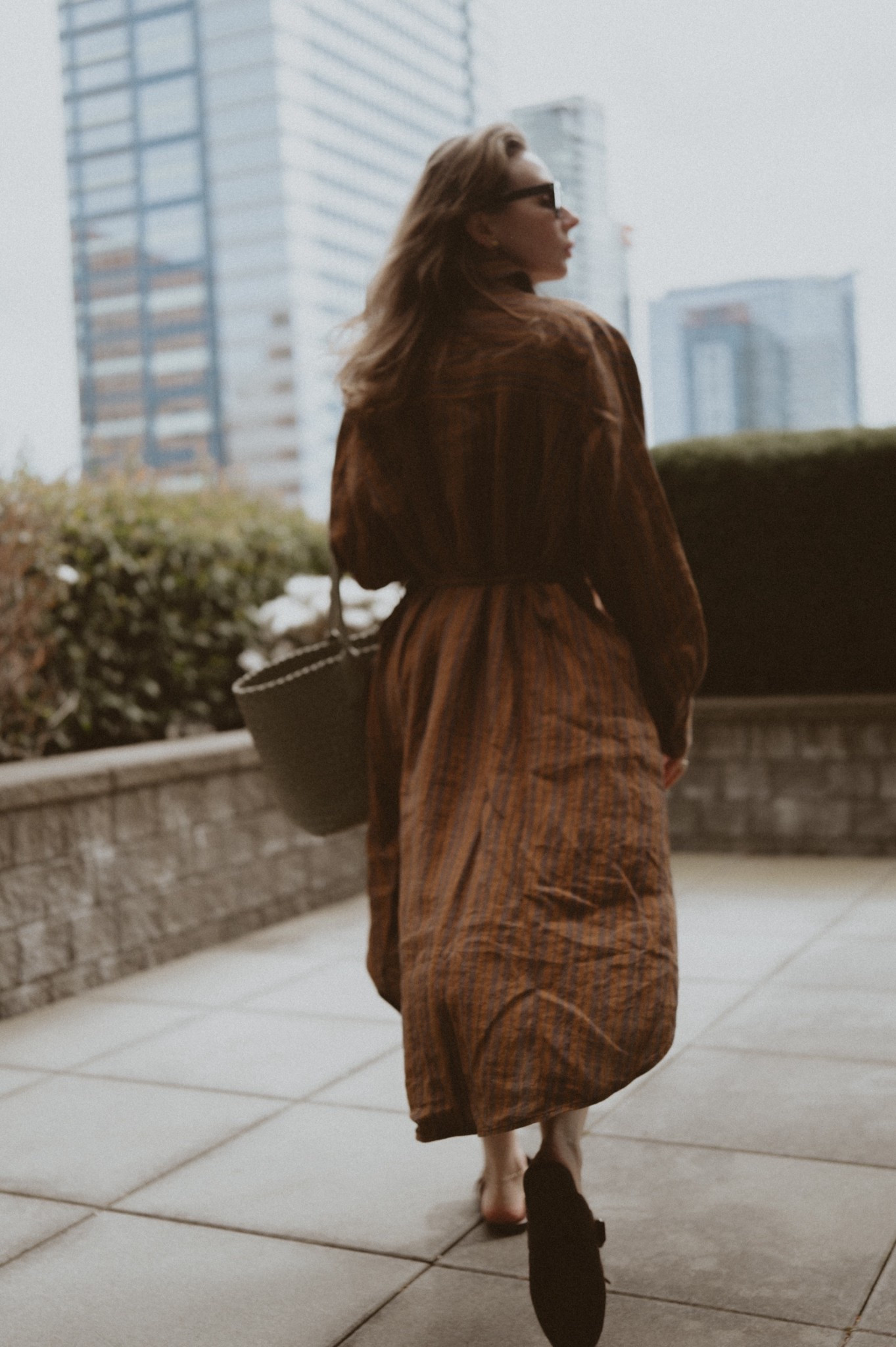 Shirt dress + mules + woven summer bag: good for weekend or week day. 
Dress: Banana Republic linen dress
Mules: Prada Shuffle mules 
Intrecciato bag: Bottega Veneta Cabat 

#LTKTravel #LTKootd #LTKWorkwear