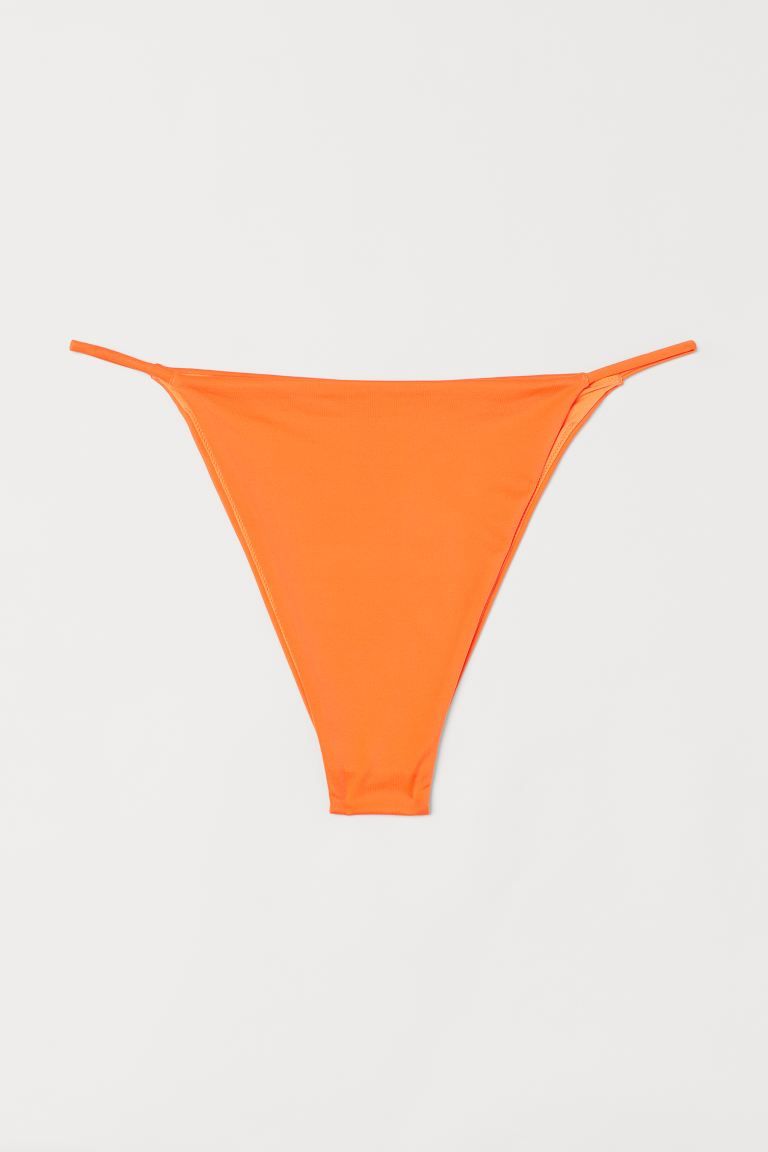 Fully lined bikini bottoms with a regular waist and high-cut legs. Cutaway coverage at back. | H&M (US)