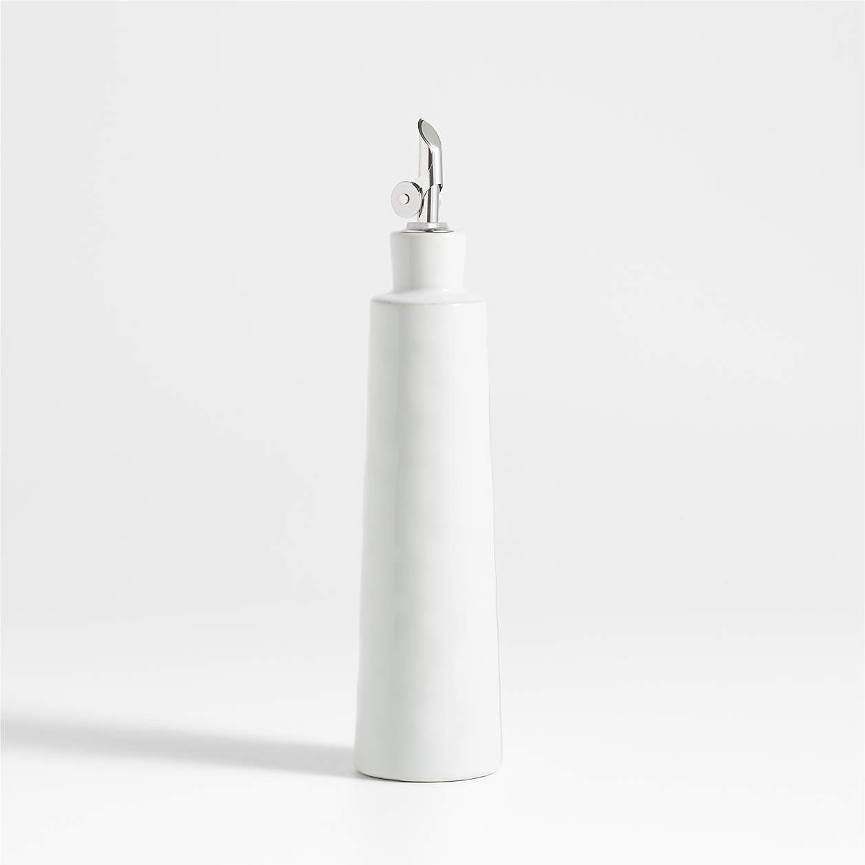 Marin White Stoneware Oil Cruet With Silicone Spout + Reviews | Crate & Barrel | Crate & Barrel