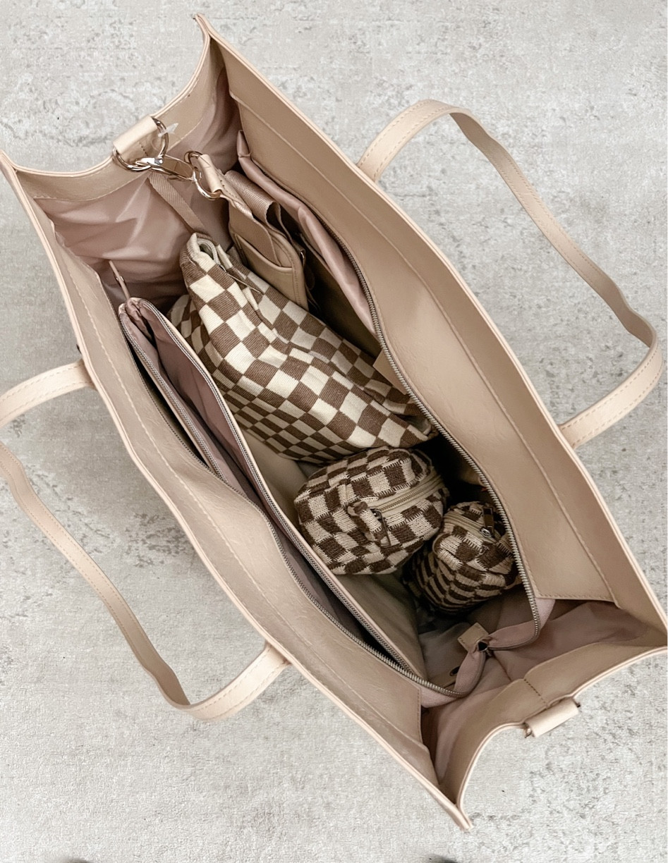 I used this bag as my personal item while traveling and it fits so much! I was able to store my makeup, toiletries, curling iron, brush, laptops, chargers, tripod, gimbal, snacks, 2 small cross body bags, water bottle, and other small travel essentials! 

#LTKitbag #LTKFind #LTKtravel