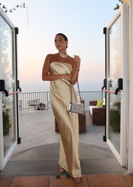 Also comes in white — satin strapless maxi dress with rosette neck detail 

Perfect for vacation, wedding events and more. Wearing size XS 

#LTKtravel #LTKstyletip #LTKwedding