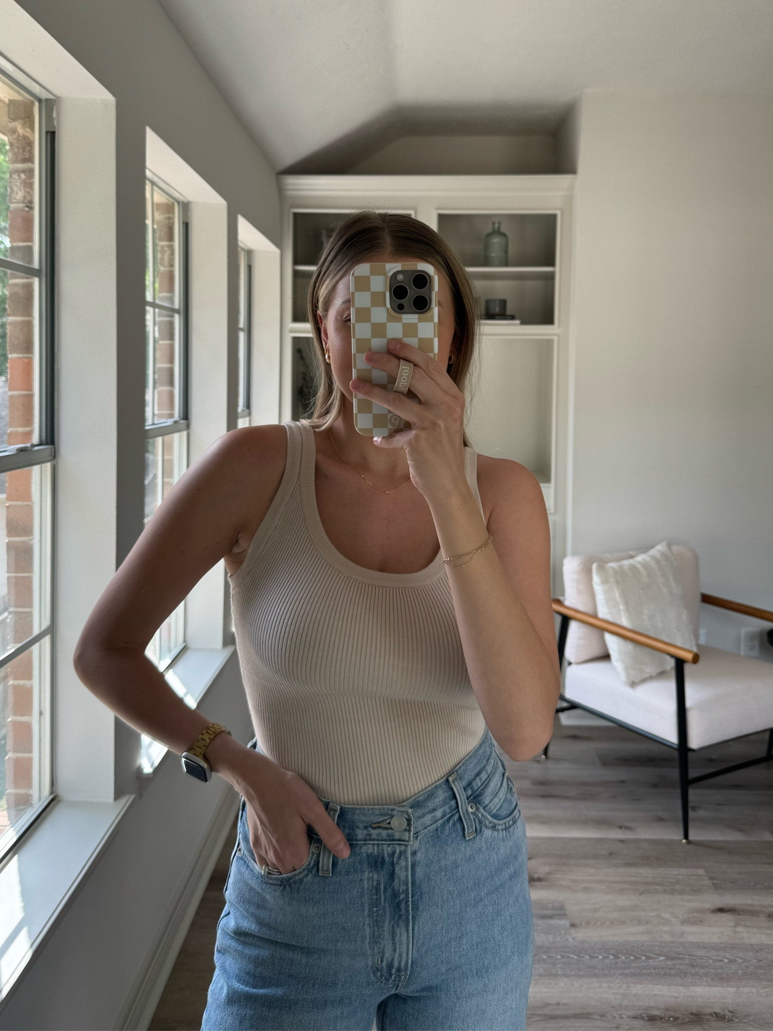 Spring basics! Wearing a S in tank and 26 in jeans. 

#LTKstyletip #LTKSeasonal