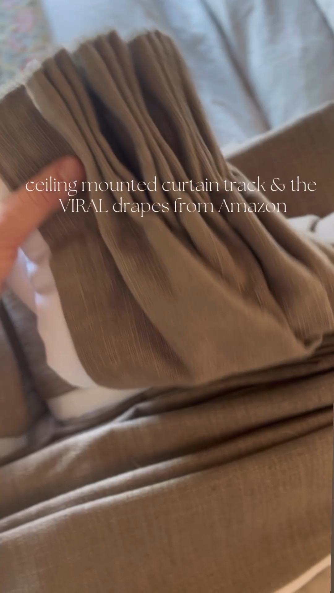 The viral Amazon drapes! I used a ceiling track and painted it to blend in. Curtains are Oak Dim Gray at 75-95% room darkening. 

#LTKhome #LTKVideo