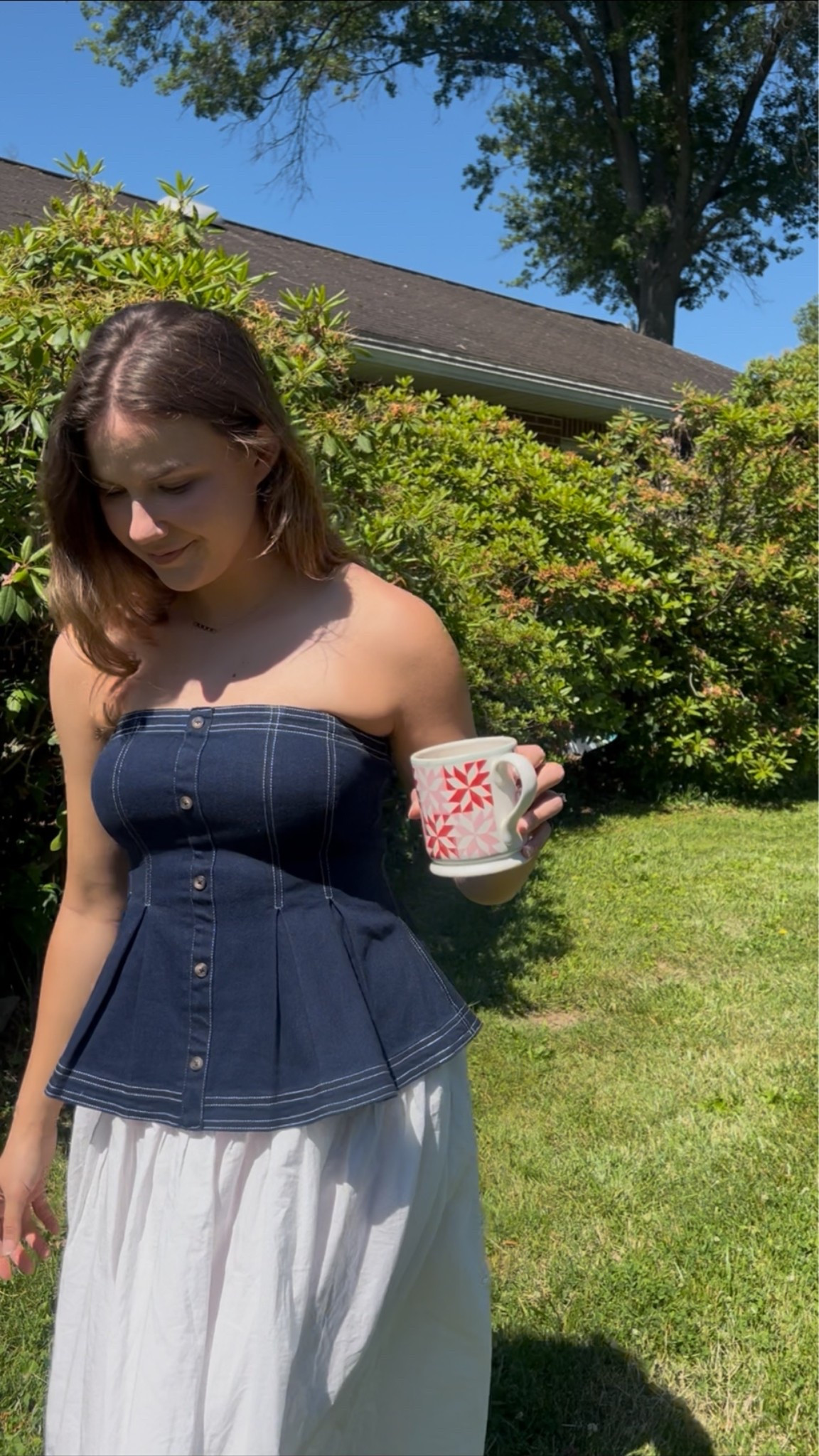 6/3/26 OOTD: whimsical outfit for working from home and checking on your plants 😆 quilted mug is from Terrain, strapless peplum denim top is from Anthropologie’s Pilcro, and white lace midi skirt is from Free People’s Gesibelle set in white! 🤍 mostly secondhand, so linking similar looks!

#LTKootd #LTKmorningroutine #LTKSeasonal