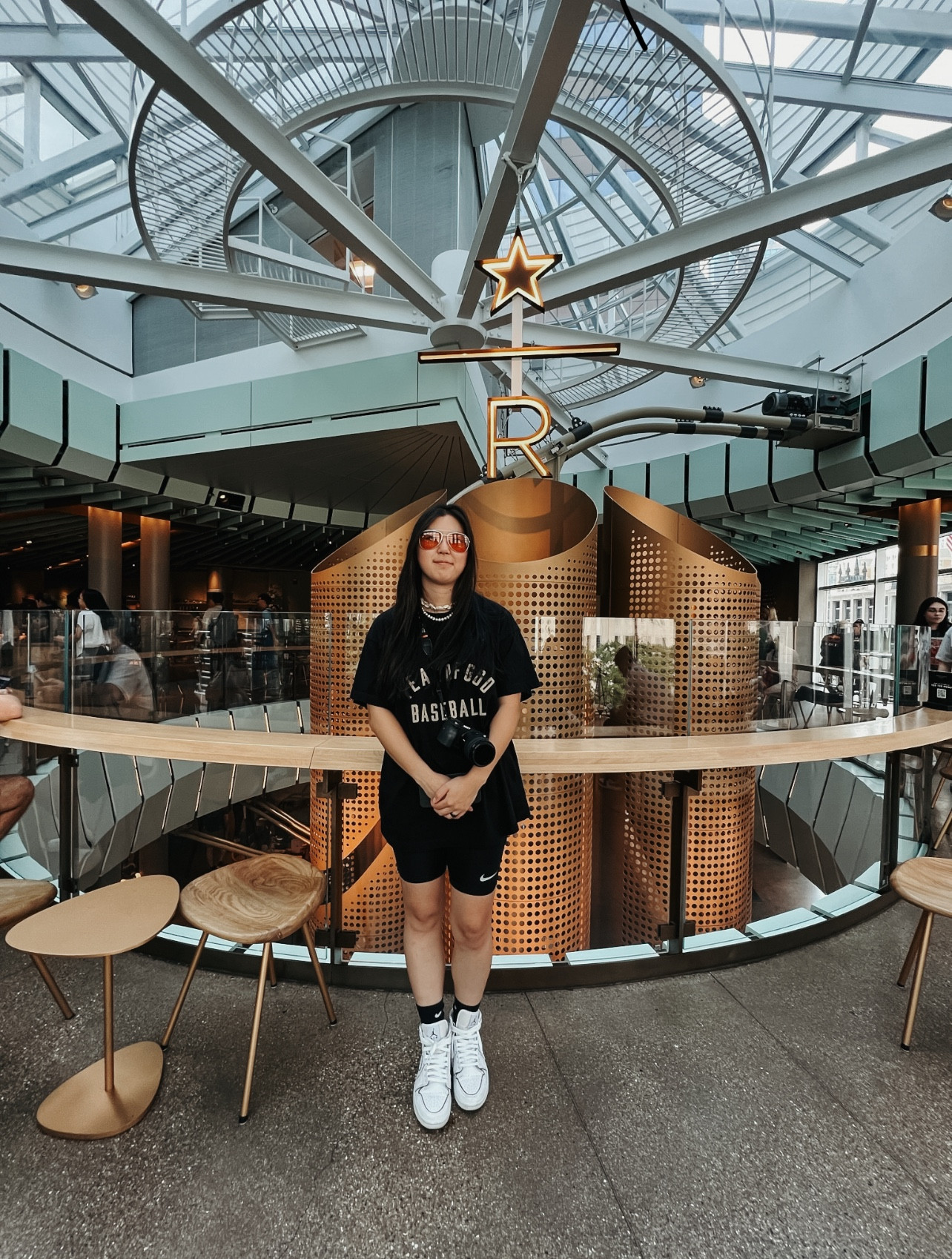 Chicago Starbucks reserve. The amount of people that went here was insane! 😅 but it was exciting to check this place out. My orange Prada sunglasses are out of stock but I found some similar ones that Tom Ford is selling. 

#LTKstyletip #LTKtravel