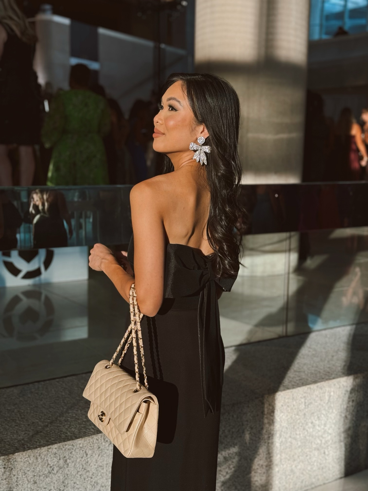 Black formal dress that is 40% off and wearing size 00. I adore the giant bow, because it adds extra detailing making the dress stunning. Perfect for formal events, holiday parties, weddings and more. Paired it with bow earrings that are amazing quality and make a statement. 

#LTKSaleAlert #LTKStyleTip #LTKParties