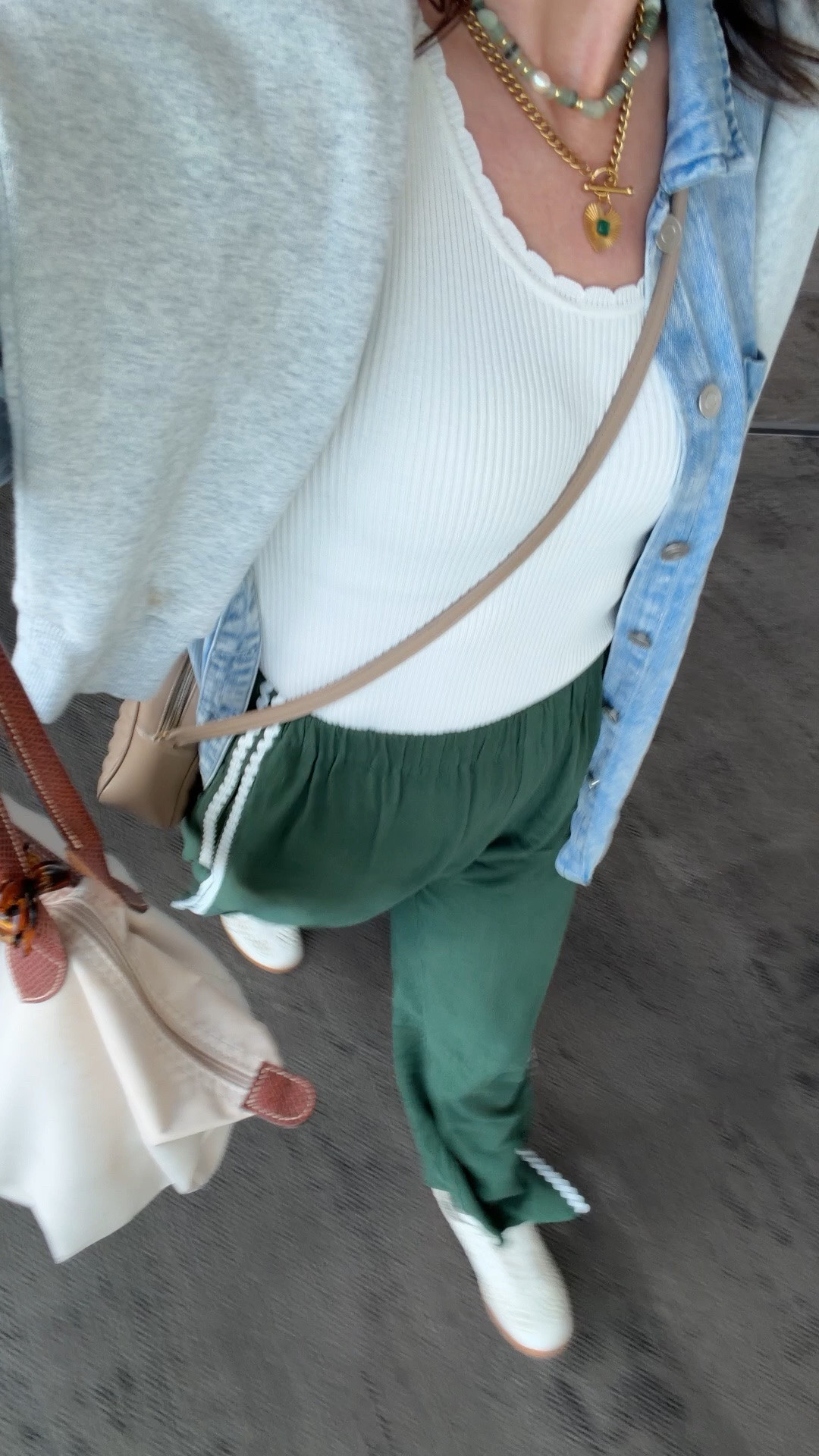Travel day outfit. These track pants are not available to link on this site. See Instagram stories for more info. I linked similar ones. I love this ribbed, scalloped edge tank. Comes in multiple colors. I have a small. The shoes are the mvp. True to size. Mules and sneakers had a baby and I love her 

#LTKootd #LTKTravel #LTKdayinmylife