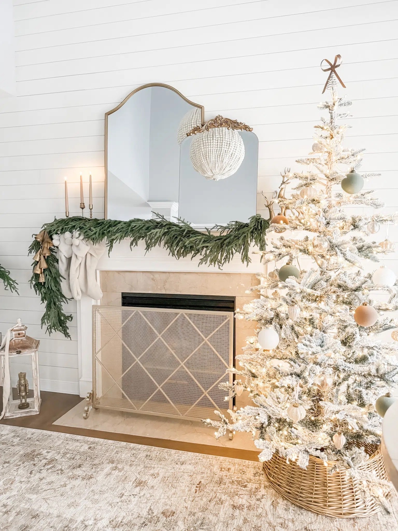 King of Christas flocked Christmas tree
Bow tree topper
Woven tree collar
Velvet Christmas ornaments
Flocked Christmas balls
Tree shaped taper candles
Real touch Norfolk garland
Gold nutcracker
Living room area rug
Neutral decor
Gold Fire screen 
Fireplace screen
Mantel decor
Christmas mantel
Gold arched mantel mirror
Christmas decor 
Christmas living room 
Dining room 


#LTKHome #LTKHoliday #LTKSeasonal