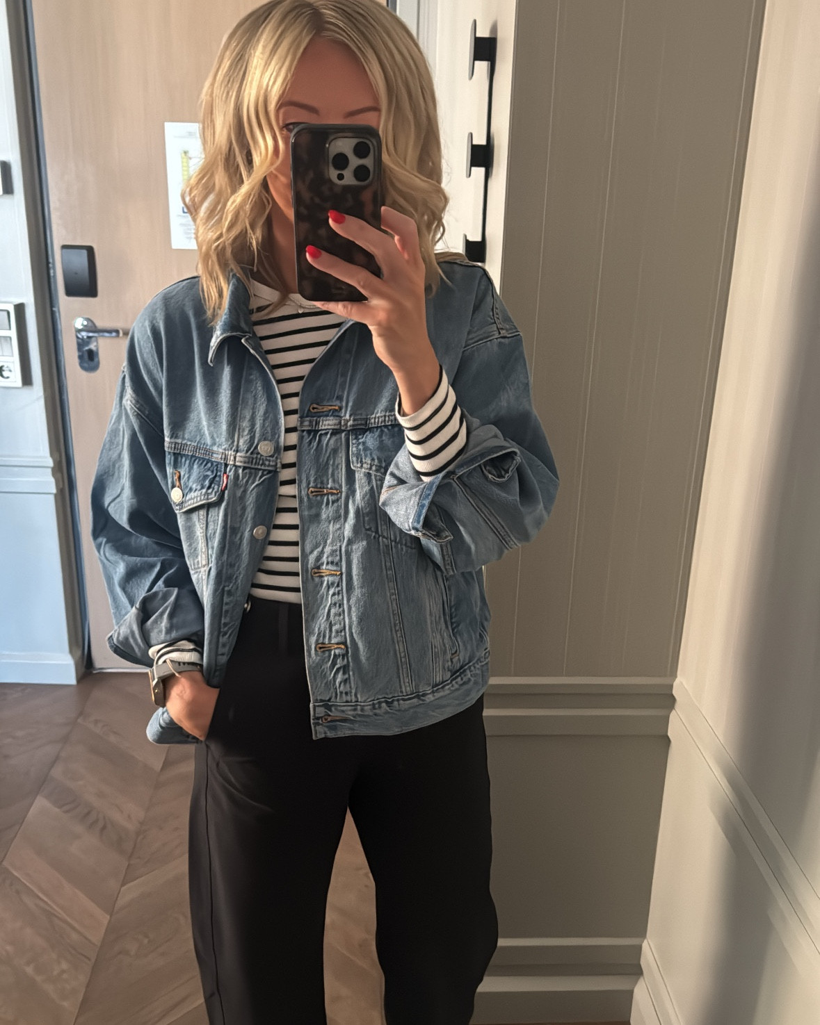 14 days in Copenhagen, Stockholm and all over Norway. These staples all fit in my carryon, mix and match so well, and got me through 2 weeks of travel. 

Trench coat
Jean jacket
Rain jacket 
2x denim (I could have done 1)
1 shorts 
1 black pants 
1 leopard pants 
Sweatsuit 
1 sweatshirt 
1 sweater 
1 white tee 
1 grey tee
1 striped long sleeve 
1 leggings for hike 
3 shoes (1 for hiking, 2 casual) 