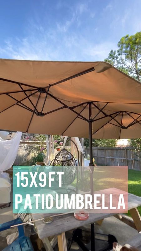 Shade in the backyard is a luxury in Texas. This extra large, 15 x 9’ patio umbrella does the trick! It’s a great value because it includes the base and is HUGE, like a triple sized market patio umbrella providing ample shade, even greater shade cover than the backyard pergola we previously built and 1000x faster and easier to put together. 

Simply anchor the base in a patio table- we used a hole cutter to put this through the middle of our picnic table. When not in use, simply wind it down and put a cover over it (optional). 

#LTKSeasonal #LTKhome #LTKfamily