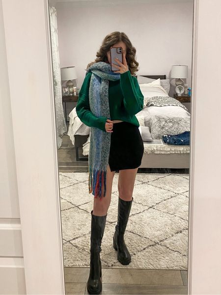 A green sweater paired with a black mini skirt, black knee high boots and chunky scarf makes a cute winter outfit idea.
.
.
.
.
.
.
.
Fall outfits | holiday outfit | sweater outfits | sweater and skirt outfit | fall sweater | fall boots | fall fashion | knit sweater | oversized sweater | winter sweater | skirt outfit | skirt and boots | skirt fall | black skirt outfit | mini skirt outfit | boots outfit | black boots | fall boots | knee high black boots | platform boots | leather black boots | outfit inspo | outfit ideas | Christmas outfit | thanksgiving outfit | winter scarf | chunky scarf 

#LTKHolidaySale #LTKGiftGuide #LTKSeasonal #LTKFind #LTKunder50 #LTKunder100 #LTKHoliday #LTKU #LTKsalealert #LTKfindsunder50 #LTKfindsunder100 #LTKstyletip #LTKworkwear #LTKtravel #LTKshoecrush #LTKitbag #LTKparties 