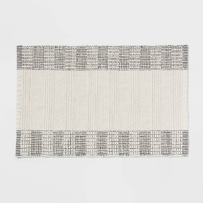 24"x36" Chenille Bath Rug Ivory with Black Boarder - Threshold™ | Target