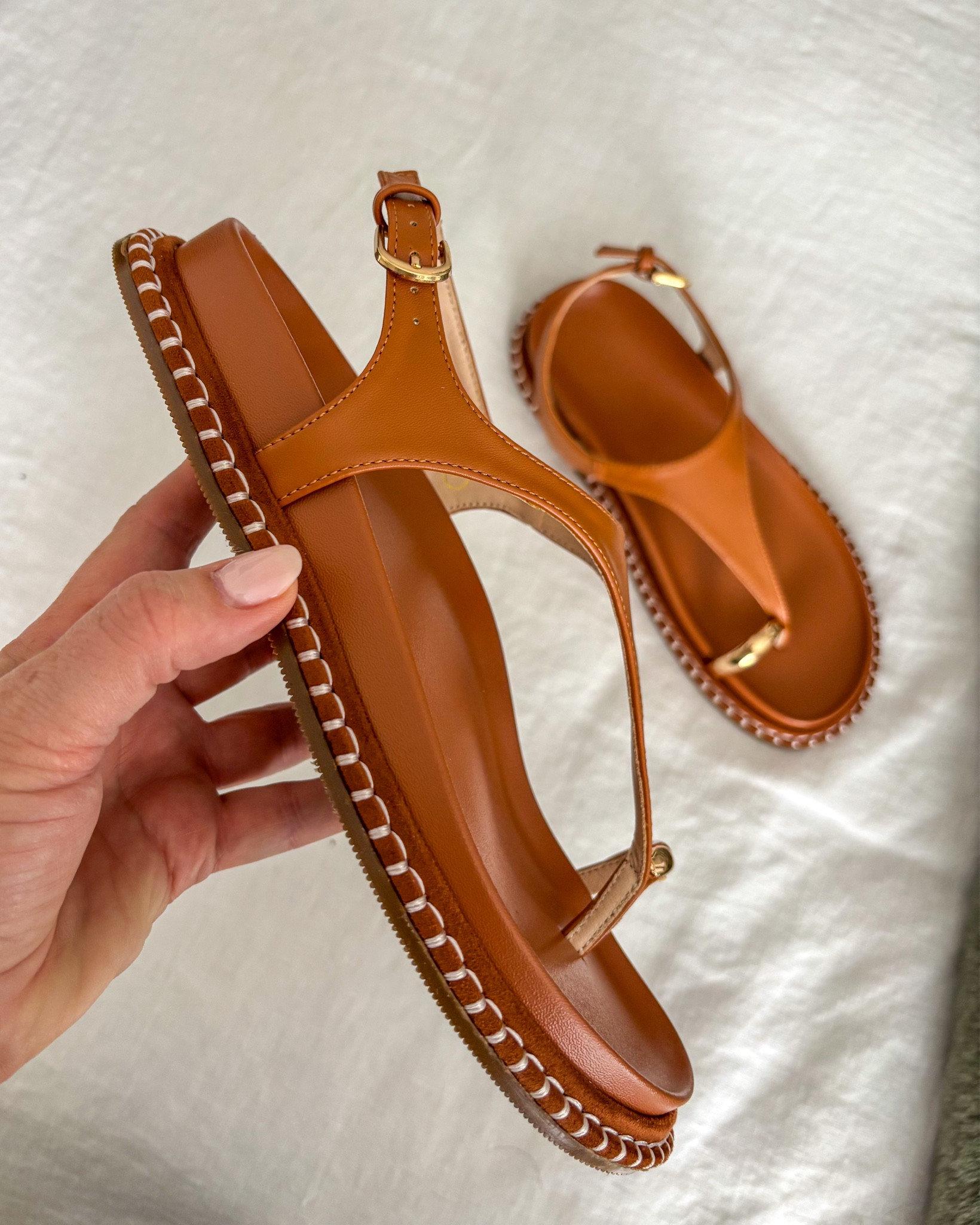 The chicest tan sandals. They’re chunky but not too chunky. Very premium. Wearing TTS - size US7 . Follow for more. 


#sandals #chic #spring #shoestyle @amazon 

#LTKTravel #LTKSeasonal #LTKOver40