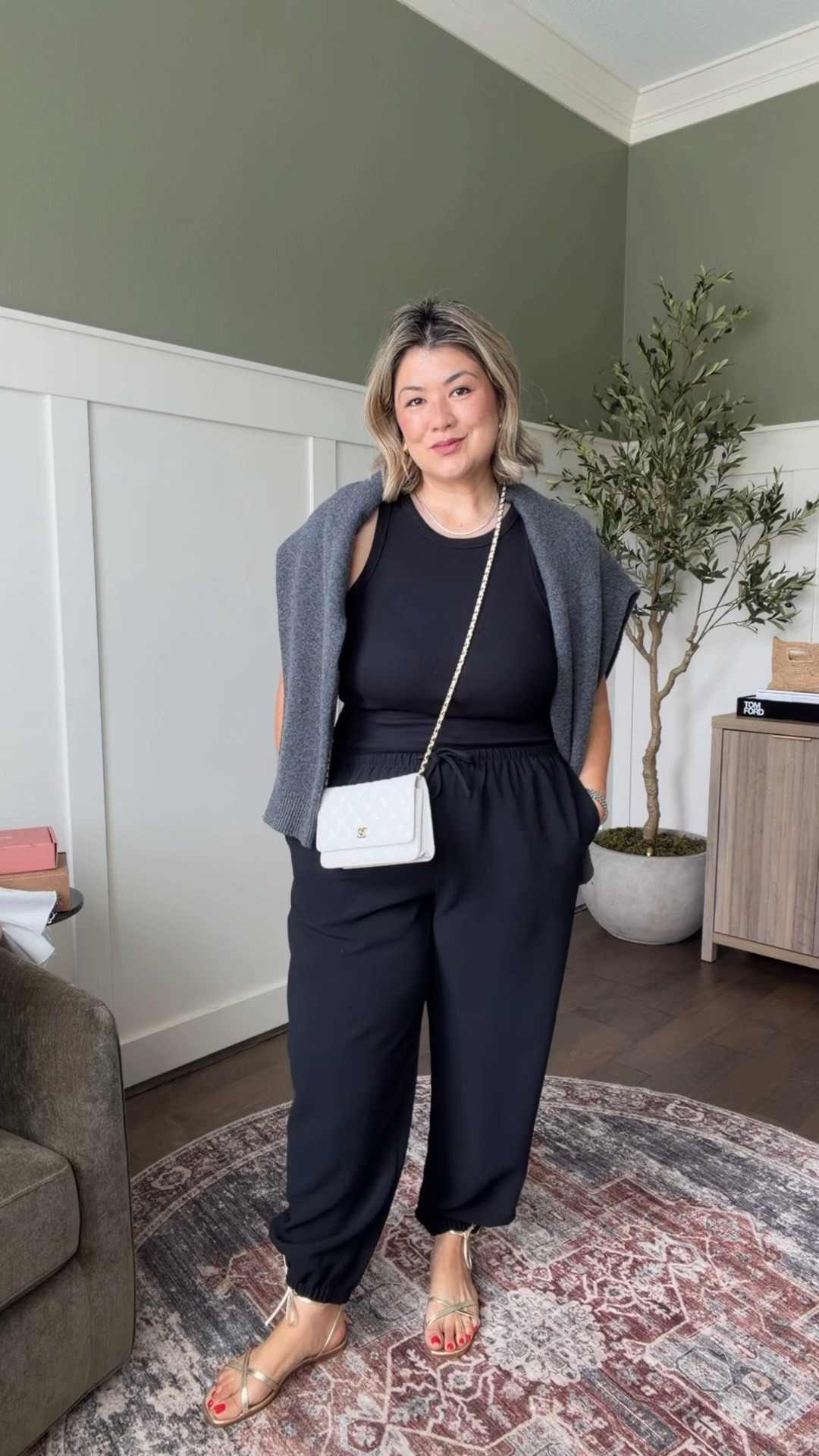 I’ve worn this exact outfit several times because it’s just so comfortable yeah I feel very chic in it. I bought these pants about six months ago and they sold out very very very quickly. I bought the black and also the light birch because I love them so much. And I guess there was some pretty high demand because they are officially back, in stock, in way more colors, and in all sizes. I am wearing a large here. They fit very loose, if in between I may suggest sizing down one. I paired it with my high neck ribbed black tank top that I have shared several times. I have it in multiple colors because I love the quality of them and the way that it is cut fits my bra straps exactly which is an amazing feature to find in a high neck tank like this. I then draped my very first ever Aritzia sweater that I bought several years ago (that is still in amazing shape) over top. If there was only one sweater that you wanted to try from this store, this would be the one. Over the years I have purchased several colors because it is such an easy sweater to wear. I have it in both a medium and a large, the fit is definitely oversize so depending on how oversize you want it, select accordingly. As for the shoes, these are my lace up sandals that I hesitated about buying for so long but now regret waiting as long as I did. They are so comfortable and stylish, and just the extra touch of flare to any outfit. They run true to size.

#LTKootd #LTKOver40 #LTKMidsize