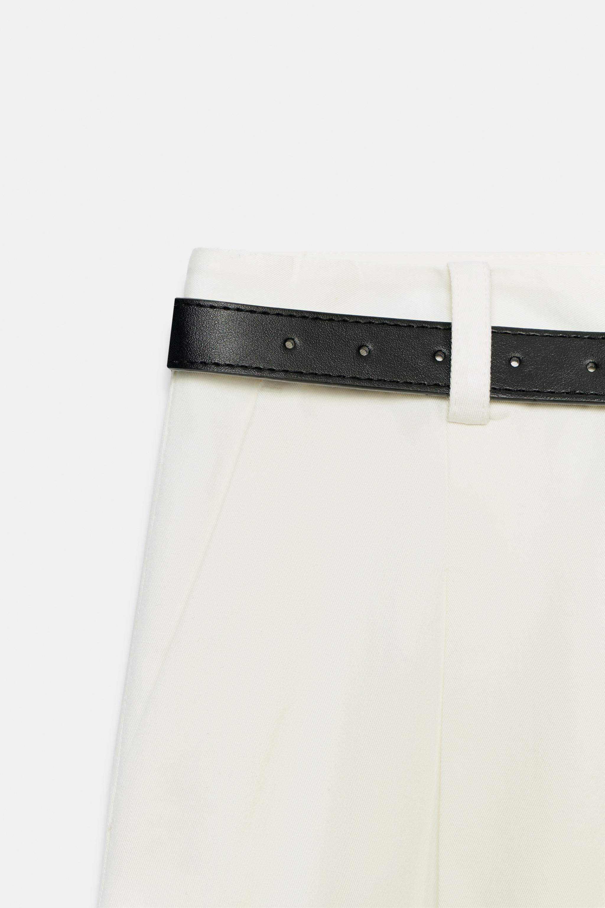 High-waist Bermuda shorts with front darts and a belt. Featuring front pockets, false rear welt p... | Zara DE