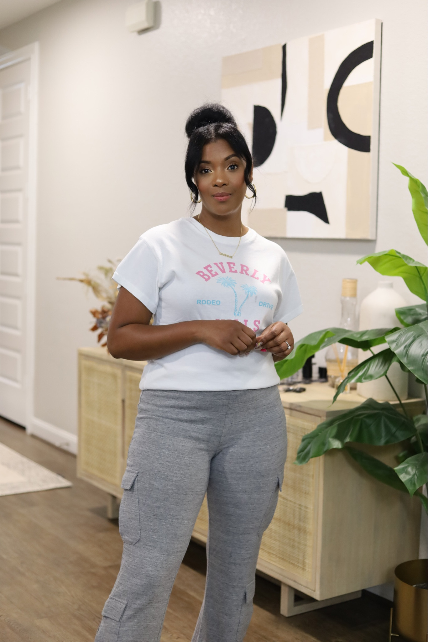 White tee, cargo pants. Loungewear. Outfit goals revolve! 

#LTKover40 #LTKstyletip #LTKtravel