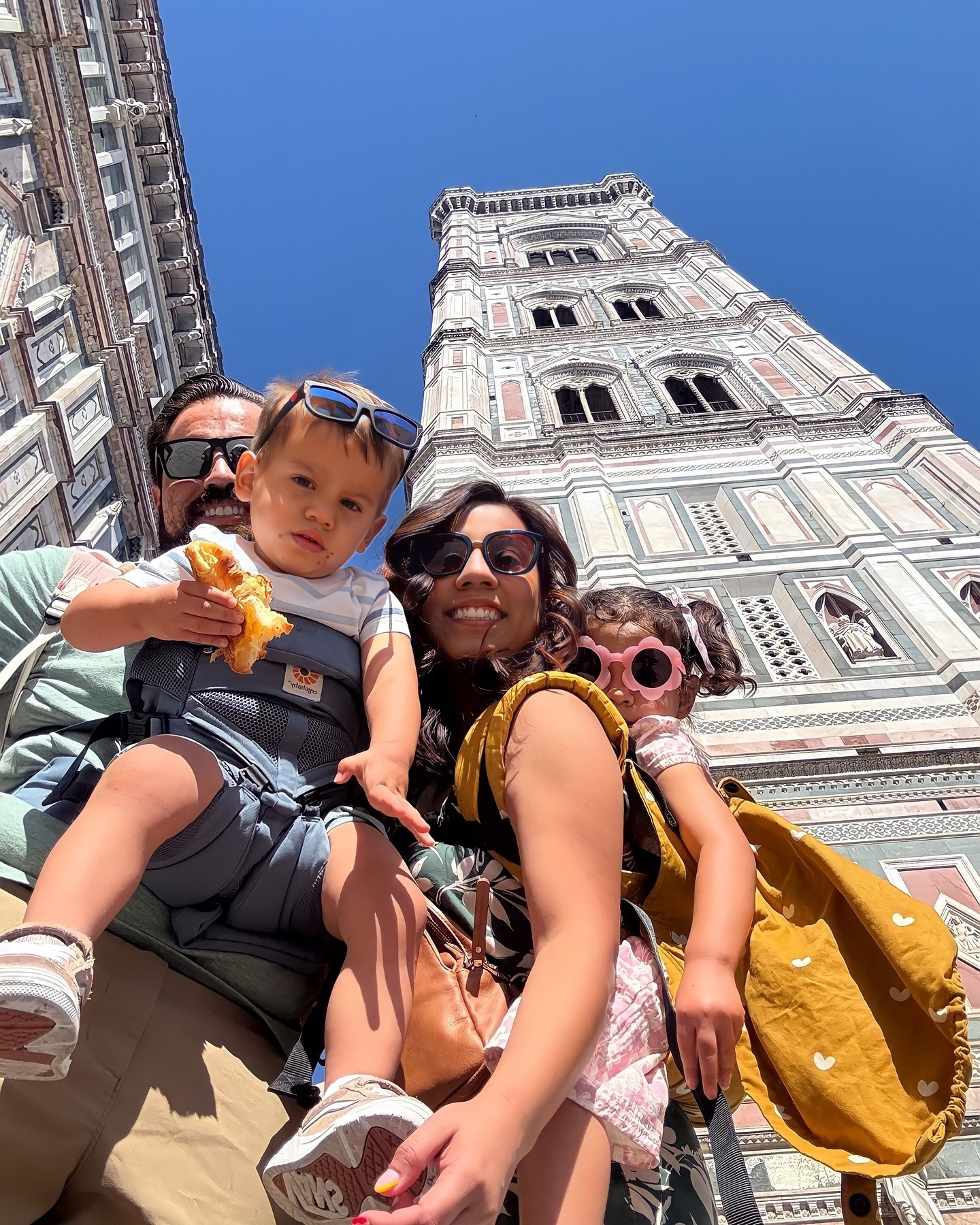 Recapping one of our favorite adventure days in Florence. We started with pastries and my usual café latte before heading off to climb Giotto’s Bell Tower. It’s 414 steps to the top. I had Emy in the carrier, and Zach had Koa. We definitely got some stares. A lot of them felt like people were cheering us on, kind of like “wow, you brought your kids and you’re doing it,” which was really encouraging. And yeah, maybe a few people looked at us like we were crazy too.

There were a few spots along the climb where we could stop, catch our breath, and enjoy the views. Once we made it to the top, the view of the Duomo and the city was stunning. Totally worth it.

After lunch, we visited the Accademia Gallery to see the Statue of David. It’s huge in person and so impressive. We also saw some of Michelangelo’s unfinished sculptures,which was cool.

Later, I finally found one of the things I was really hoping for ….a wine window!! We just happened to walk by it and stopped for a quick glass. Definitely one of my favorite moments of the day.

#FlorenceItaly #GiottosBellTower #TravelWithKids #AccademiaGallery #StatueOfDavid #Michelangelo #WineWindow #FamilyTravelEurope #FlorenceWithToddlers #Italy2025 #TravelRecap #LTKTravel #LTKFamily #TravelMomLife #FlorenceAdventures