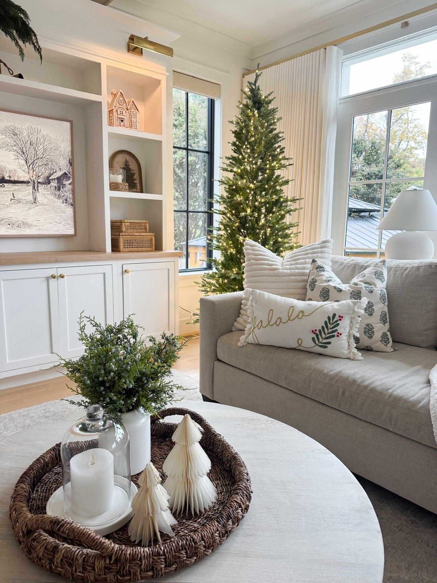 Cozy neutral living room with slim faux Christmas tree, classic green and gold holiday decor 

#LTKSeasonal #LTKHome #LTKHoliday