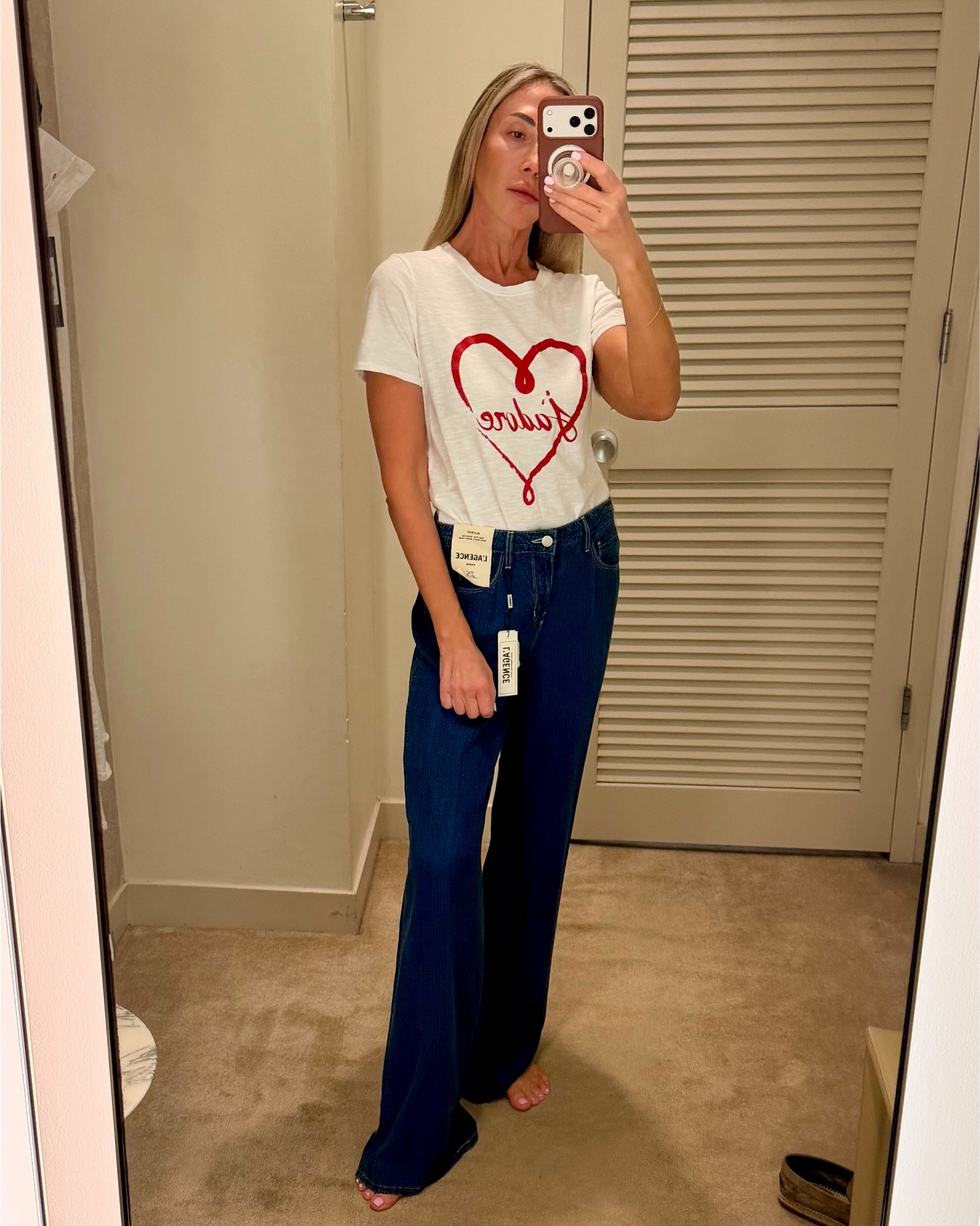 If you’re looking for wide-leg, high-rise jeans, this L’AGENCE pair is a great choice. They run slightly big, so I recommend sizing down🤍

#LTKOver40 #LTKvlog #LTKootd