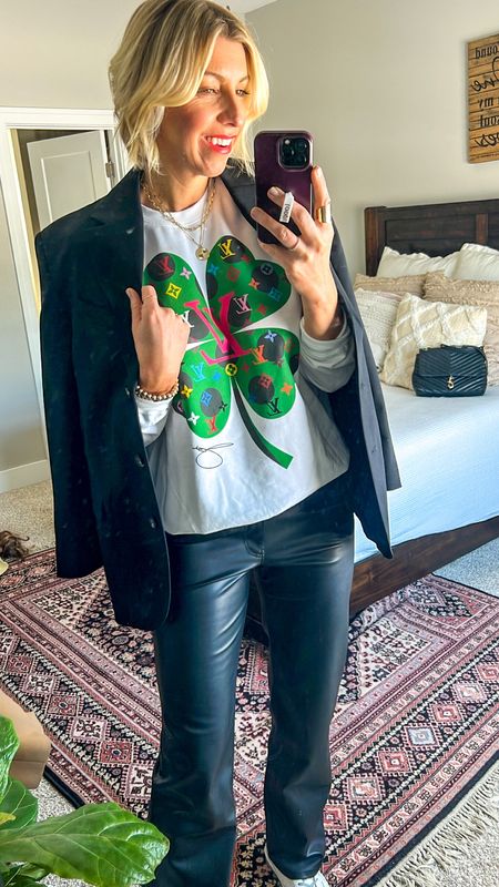 How to style an overszied graphic sweatshirt: cuff the sleeves to show your wrists, add a blazer for some polish! 

Use my code: SARAH10 for 10% off this @byjodipedri #ByJodiPerdri sweatshirt 

I sized up to a medium for an oversized fit ☘️

#LTKstyletip #LTKFind #LTKunder100