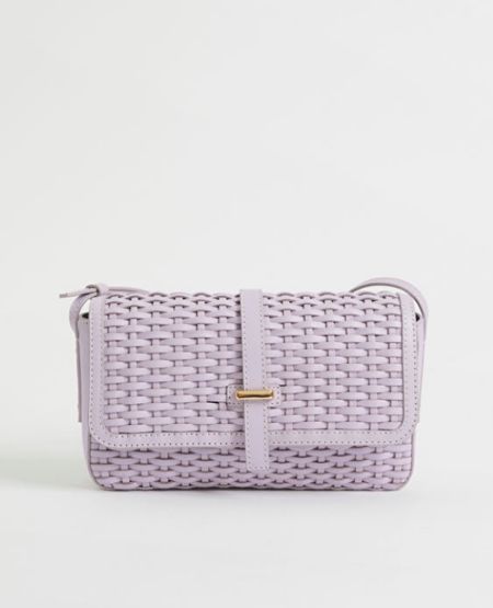 A pastel bag that will complement a monochromatic look so well.