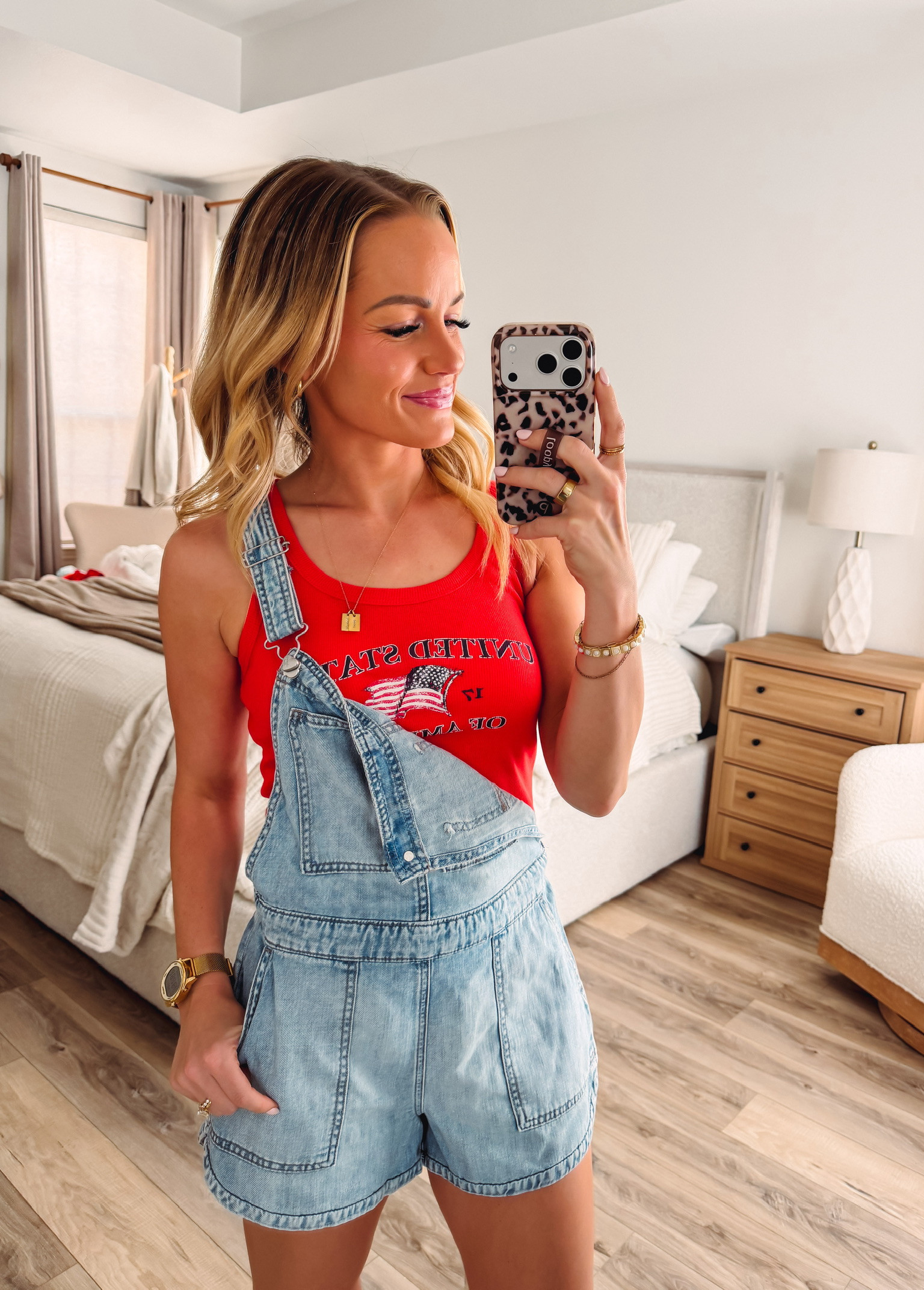 This Americana look is perfect for summer! The drapey denim shortalls are so comfortable and on-trend, and the red graphic tank with the American flag adds the perfect patriotic touch. Love how the dolphin hem detail makes the shortalls feel more elevated. Great combo for Fourth of July or any casual summer day!
 

 #LTKootd #LTKmomlife #LTKSeasonal