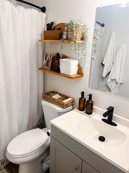 Small space bathroom! Add extra storage space and organization with floating shelves and baskets/bins to store items! 
(Sadly World Market does not carry my floating shelves anymore, but I linked a couple other options!)

#LTKfamily #LTKhome #LTKstyletip